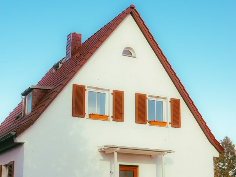Einfamilienhaus in Belm, Putzfassade und Klappläden neu beschichtet